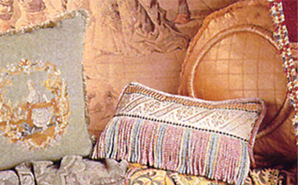 unique cushions & antique tapestry in background